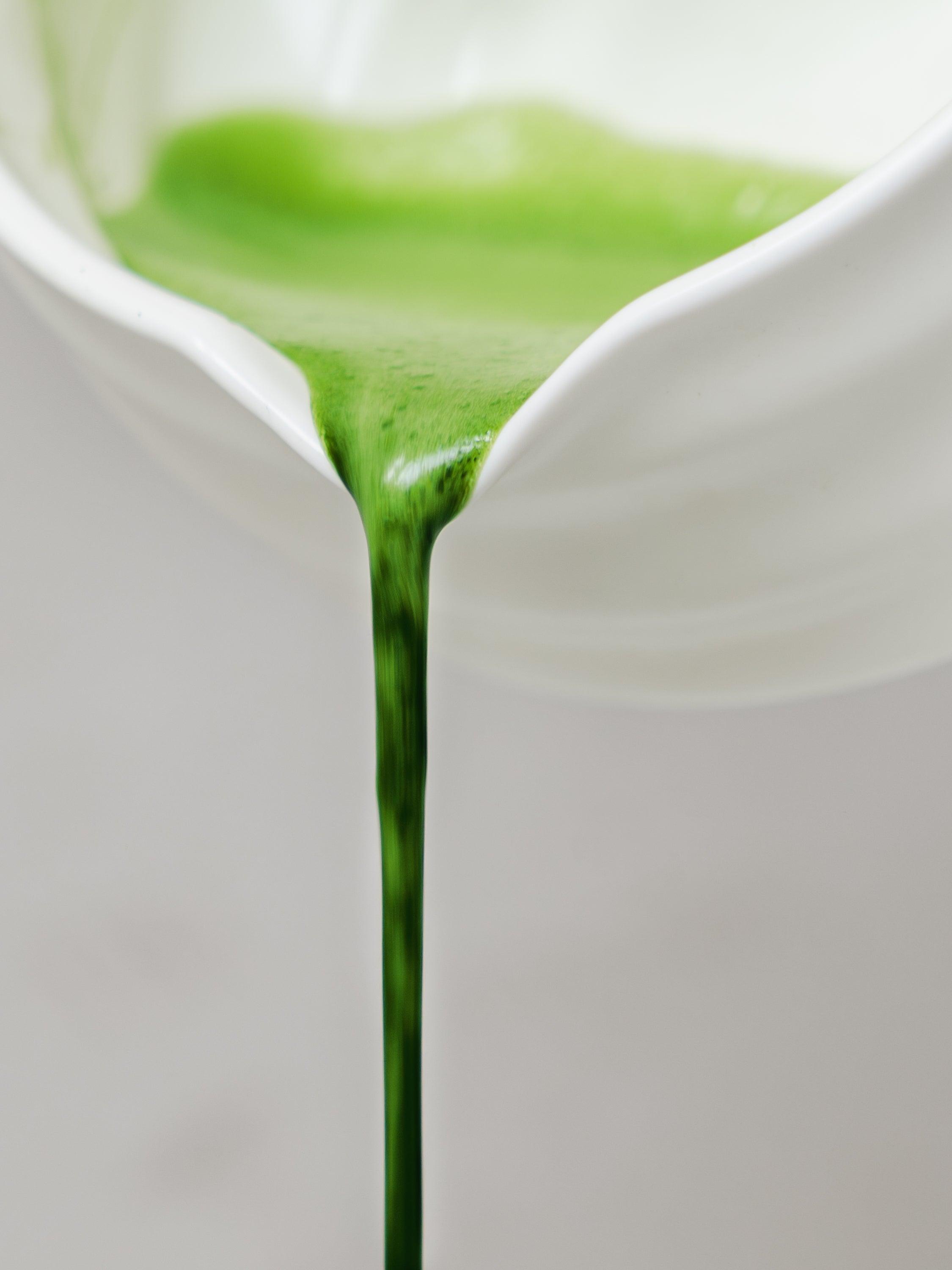 Matcha pouring vibrant green jade green ceremonial matcha